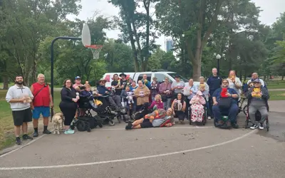 Group photo of KWA members at the 2025 teddy bear picnic