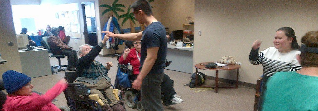 Participants in a health and wellness course, performing various exercises.